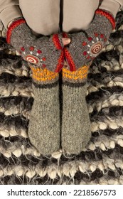 Warm Woolen Clothes. Close-up Of Warm Mittens And Socks.