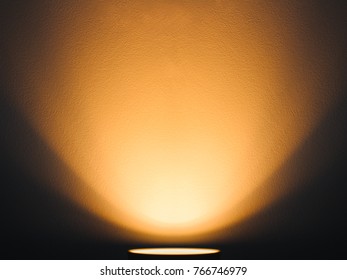 Warm Yellow Light From The Lamp. Backlight From Below.