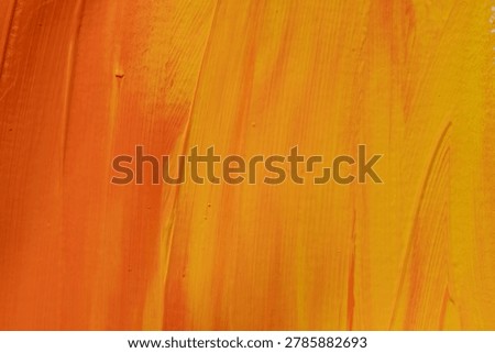 A warm-colored background painted in orange.