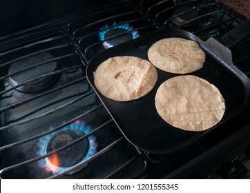 Warming Up The Corn Tortillas For Dinner