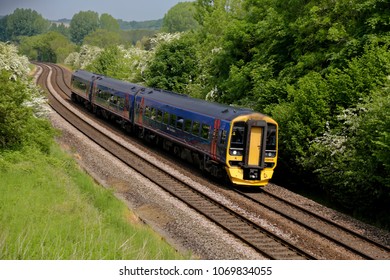 Warminster, Wiltshire, UK - June 28, 2016: A British Rail Class 158 Express Sprinter Train In First Great Western Livery 