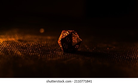 A warmly light 20 sided dice