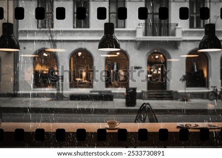 Warmth cafe on a dull day in Oslo. Classy dark rainy day image from a coffee shop window. Classic scene inside a classy modern stylish cafe or coffee shop. Dark gloomy rainy day aesthetic.