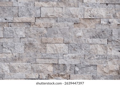 Warm-toned wall surface with light staining and a rough edge. Natural texture ideal for modern visual designs.