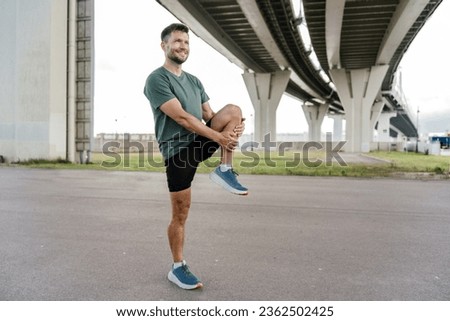 Warm-up man confident interval training. Confident person exercise fitness for health.  An athlete is taking a break from rest, jogging in sportswear. Psychological therapy.