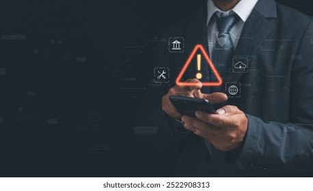 Warning or alert, technology scam, tech crime Concept ,Man show warning of access to software, dangerous cyber attack or online network hacked threat, technology security with smartphone.