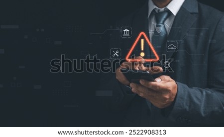 Warning or alert, technology scam, tech crime Concept ,Man show warning of access to software, dangerous cyber attack or online network hacked threat, technology security with smartphone.