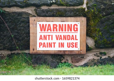 Warning anti vandal paint in use sign