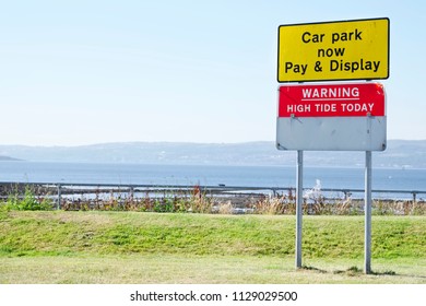 Warning High Tide Sign And Car Park Pay And Display Helensburgh Uk