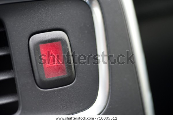 Warning light button in a\
car