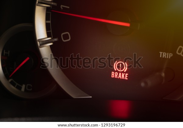 warning light handbrake\
in car dashboard