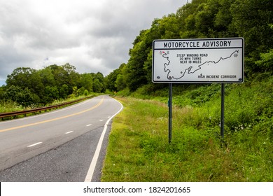 Warning To Motorcycles On Cherohala Skyway. Large sign post a warning to motorcycles entering Cherohala Skyway in North Carolina. 