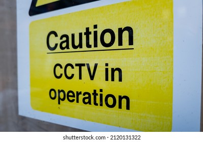 A warning notice that CCTV is in operation.
