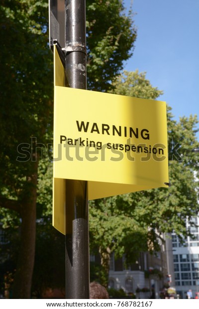 Warning Parking\
Suspension sign on parking\
bay