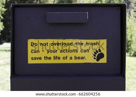 Warning sign about bears and trash in Rocky Mountain National Park in Colorado