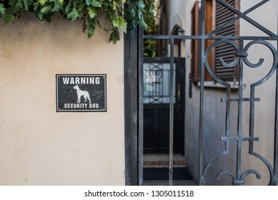 Warning Sign - Beware Of Dog Infront Of An Entrance To A Private House