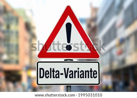                     Warning sign in city with german word for covid-19 delta variant           
