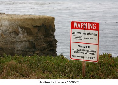 Warning sign at cliffs edge