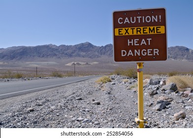 Warning sign in Death Valley National Park, California, USA. Death Valley is known for dangerously high temperatures in summer. - Shutterstock ID 252854056
