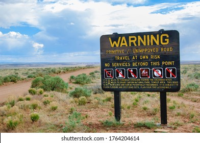 Warning Sign Declaring Absence Of Services On The Unpaved Dirt Road Through The Desert To Toroweap Point In Grand Canyon National Park, Utah, USA