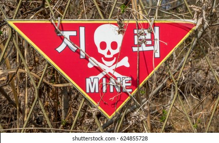 Warning Sign For Landmines Along The Korean Demilitarized Zone