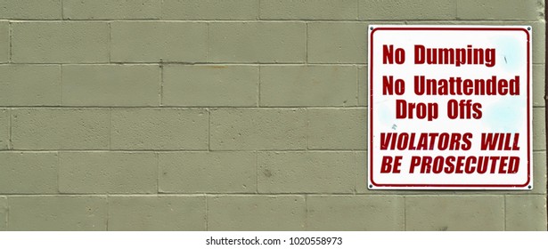 Warning sign on a block background