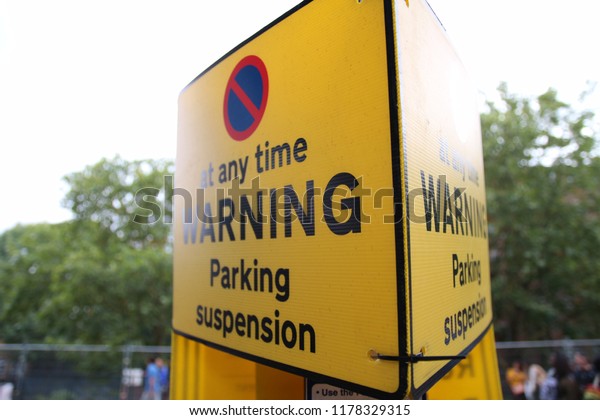 Warning sign of Parking\
Suspension