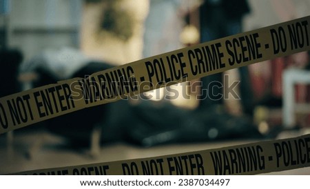 Warning sign -Police Crime Scene, Do Not Enter - on the tape in the crime scene apartment