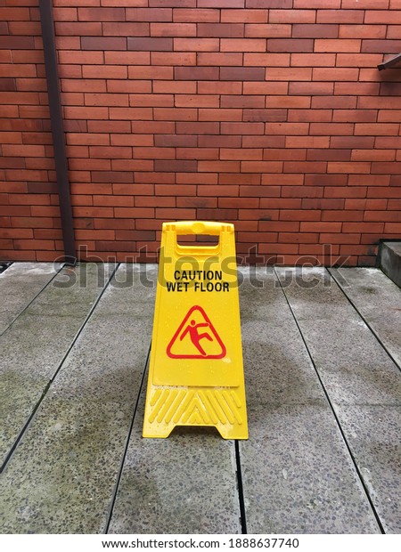 warning sign for slippery\
floors