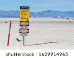 A warning sign in White Sands National Park keeping hikers away from a missile test range in New Mexico.