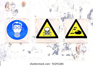 Warning Signs On A Warehouse Door Of Chemical Substances