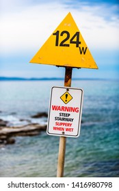 A 'Warning - Steep Stairway Slippery When Wet' Sign Installed At A Boat Ramp In Lorne, Victoria, Australia.