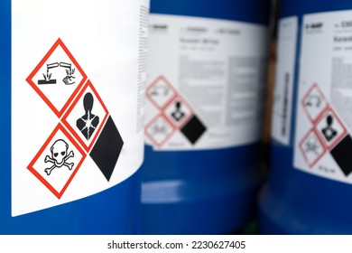 Warning symbol on the chemical bottle , hazardous chemicals in the industry