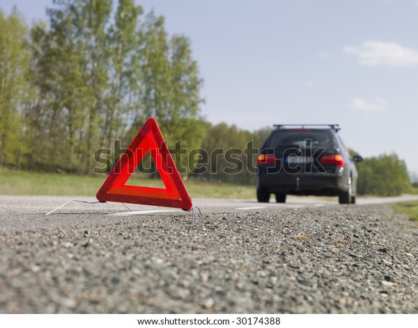 Warning triangle in
front of a car
breakdown