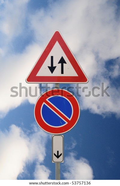 Warning two way and no\
parking road sign