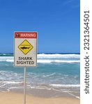 warning,shark sighted.Informative sign on beach in Sydney, Australia