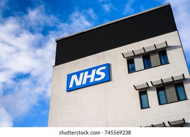 WARRINGTON, UK - MARCH 6, 2016: View of the NHS (National Health Service)  logo at the Springfields Medical Centre in the centre of Warrington, Cheshire.