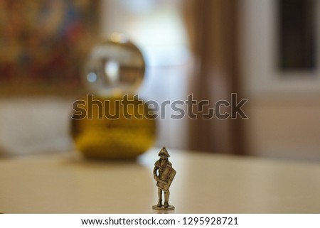 warrior in armor in room