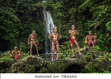 Warrior of Mentawai.The Indigenous inhabitants ethnic of the islands in Muara Siberut are also known as the Mentawai people. West Sumatra, Siberut island, Indonesia. - Shutterstock ID 738261610