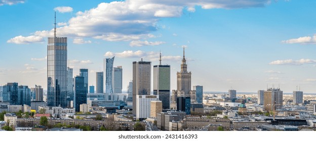 Warsaw city center, PKiN and skyscrapers under blue cloudy sky aerial landscape - Powered by Shutterstock