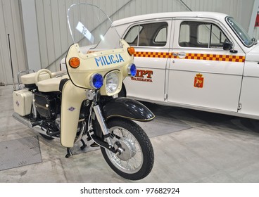 WARSAW - MAY 29: The Motorcycle Militia - MZ ES 250-2 Trophy (1968) And Taxi - FSO Warszawa 223 (1964–1973) On Display At The Classic Car Exhibition MOTO NOSTALGIA On May 29, 2011 In Warsaw, Poland.