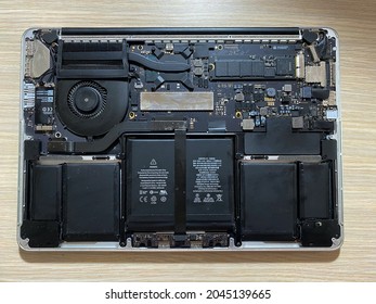 Warsaw, Poland - 09.19.2021: The Back Cover Of The Macbook Pro Laptop Has Been Opened