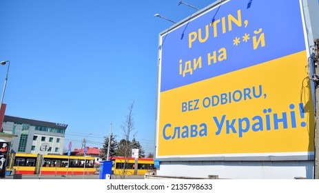 Warsaw, Poland. 14 March 2022. Placard Supporting A Defending Ukraine. Action Condemning The Authoritarian Regime In Russia. Support Of Ukraine With Placards.. Cyrillic Letters