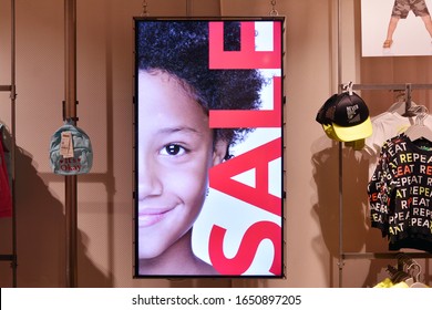 Warsaw, Poland. 18 February 2020. Digital Media Billboard For Advertising At United Colors Of Benetton Fashion Store.