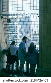 Warsaw, Poland - 1st August 2022: People Looking Out From 'The Palace Of Culture And Science' (Polish: Pałac Kultury I Nauki; Abbreviated PKiN). 