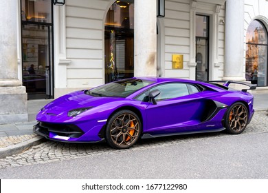 Warsaw, Poland- 7/03/2020: side view of a Lamborghini supercar parked next to a luxury hotel.