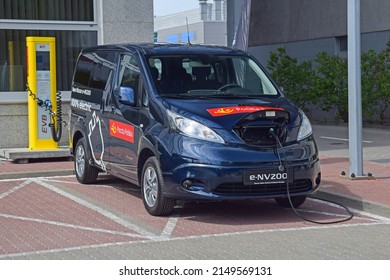 Warsaw, Poland - April, 23, 2018: Electric Commercial Vehicle Nissan E-NV 200 On The Charging Station. 