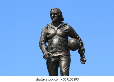 WARSAW, POLAND - AUGUST 15, 2015: A Statue Of Legendary Polish Football Coach Kazimierz Gorski. Kazimierz Gorski Was The Coach For The Polish National Team In 73 Matches (with 45 Wins).