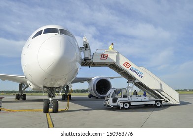 WARSAW, POLAND - AUGUST 4: New Boeing 787 Dreamliner of the LOT Polish Airlines - crew prepare the aircraft for departure at Chopin Airport on August 4, 2013 in Warsaw, Poland. 