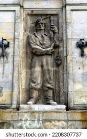 Warsaw, Poland, Europe - 09.13.2009 : Reminders Of Communist Era,  Reliefs Of Heroic Workers On Facades, Here Heroic Farmer, Marszalkowska Street